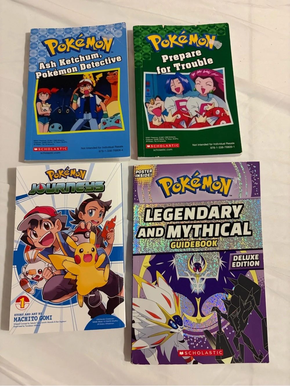Pokemon Book Lot- 4 books: 2 chapter, 1 guide, 1 graphic novel